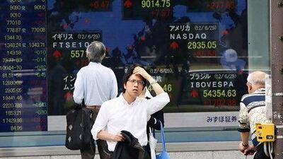 Investors have become wary of volatile stock markets, but analysts say a long-term view should help to protect their assets. Koji Sasahara / AP Photo