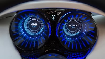 The car has blue neon lighting on the dashboard and the centre console. Courtesy Jaguar