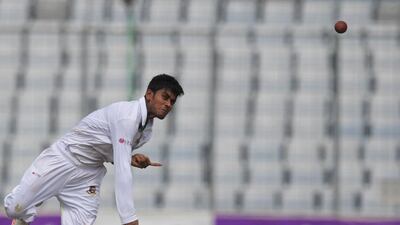 Bangladesh's Mehedi Hasan bowls during the second day of the second Test against England in Dhaka on Saturday. Dibyangshu Sarkar / AFP / October 29, 2016