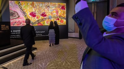 Pictured is a canvas by British artist Sacha Jafri. It later sold for $4.2 million to an anonymous bidder. Antonie Robertson / The National