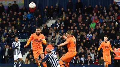 West Bromwich Albion's Danish striker Kenneth Zohore is brought down. AFP