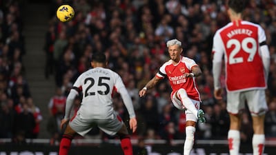 Arsenal's Ben White crosses the ball. AFP