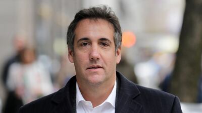 Michael Cohen, President Donald Trump's personal attorney, walks down the sidewalk in New York, Wednesday. Seth Wenig/ AP Photo