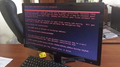 A computer screen cyberattack warning notice reportedly holding computer files to ransom, as part of a massive international cyberattack, at an office in Kiev, Ukraine on June 27, 2017 as a new and highly virulent outbreak of malicious data-scrambling software appears to be causing mass disruption across Europe and the US. Oleg Reshetnyak via AP
