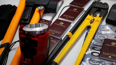 Passports, tools and other items were also shown to the media.