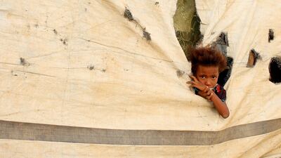 A Yemeni child who fled the fighting in Hodeidah is pictured at a makeshift camp in the district of Abs, in Yemen's northwestern Hajjah province. AFP