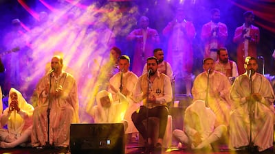 Tunisian members of the Takhmira Chants Soufis group perform in Municipal Theater of Tunis, Tunisia, 08 April 2023. EPA / MOHAMED MESSARA