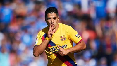 Luis Suarez of FC Barcelona celebrates after scoring Barcelona's opening goal against Getafe on Saturday. Getty