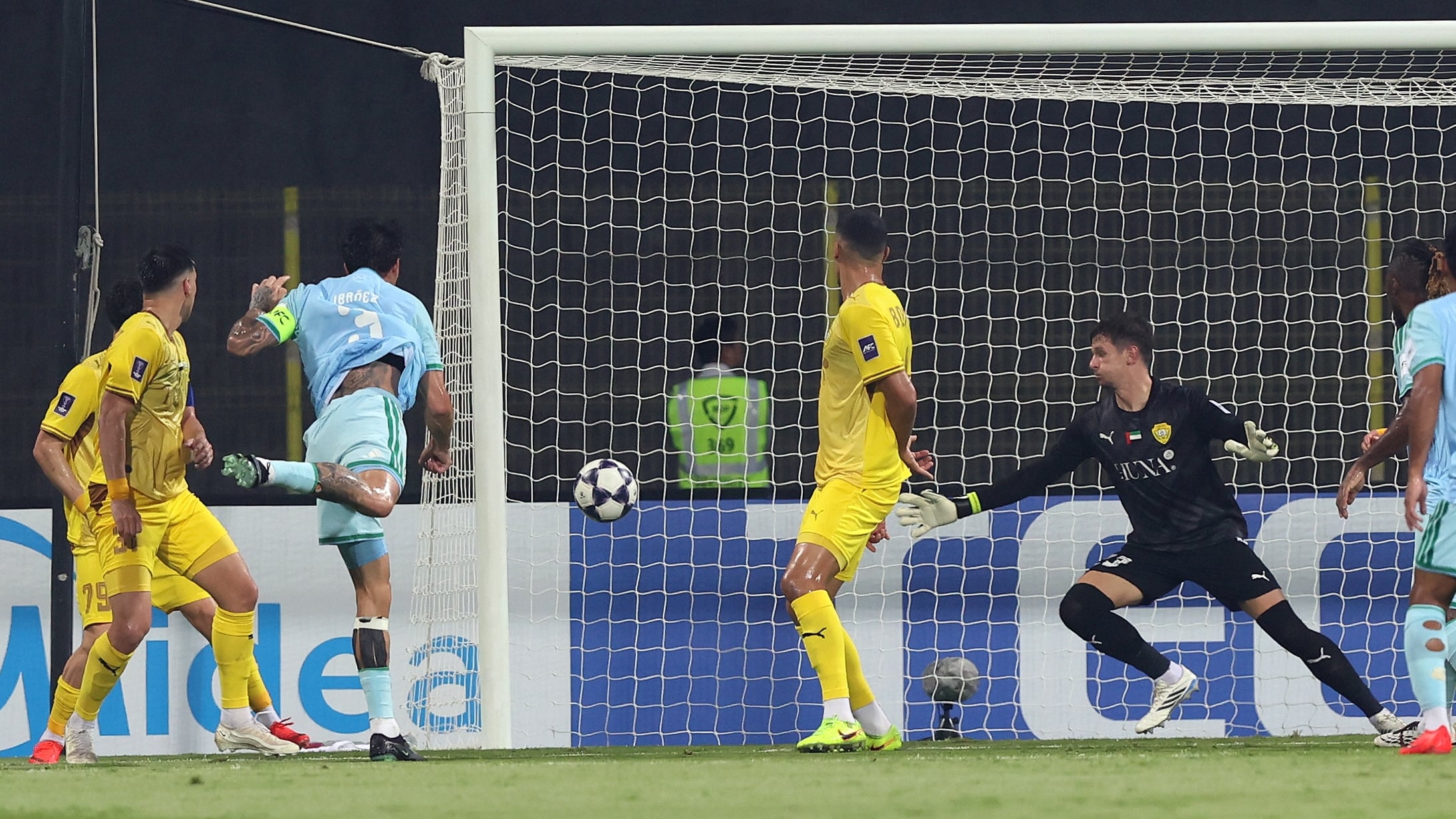 Roger Ibanez scores Al Ahli's first goal. Chris Whiteoak / The National
