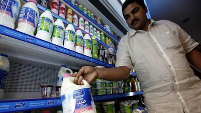 Almarai's second-quarter net profit fell by 25 per cent as revenue slumped. Satish Kumar / The National