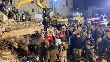 Rescue teams search for survivors in Tripoli’s Bab Al Tabbaneh neighbourhood after a building collapse. Reuters