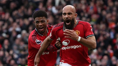 Manchester United's Bryan Mbeumo celebrates with Amad Diallo after scoring the opening goal against Manchester City at Old Trafford. AFP