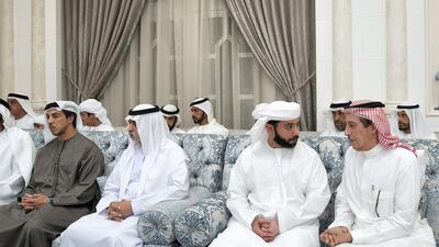Turki Al Dakheel, Saudi ambassador to the UAE, right, offers condolences to Dr Sheikh Hazza