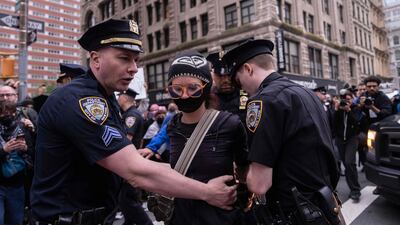 Officers detain a protester in New York City. AFP