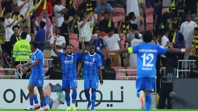 Malcom celebrates with teammates after scoring Al Hilal's second goal against Al Ittihad. Getty Images