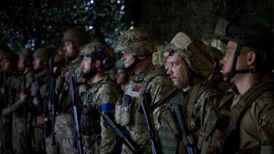 Ukrainian troops near the front line in Donetsk where Kyiv is looking to recapture territory. Reuters
