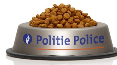 In this handout photo released by the Belgian Federal Police and placed on Twitter, a bowl of cat food with the name of the police force on November 23. AP