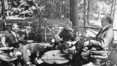 From left, Egyptian president Anwar Al Sadat, US president Jimmy Carter, and Israeli prime minister Menachem Begin meet at Camp David in 1978. AP Photo