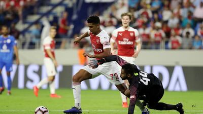 Tyreece John-Jules of Arsenal scores the third goal during the match between Arsenal and Al Nasr. Pawan Singh / The National