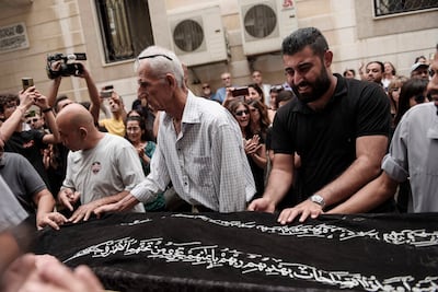 Large crowds gathered as the writer was laid to rest.