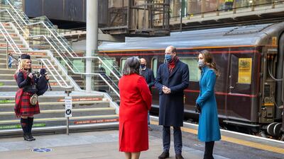 Prince William and Catherine, Duchess of Cambridge are met by Deputy Lord Lieutenant Sandra Cumming as they arrive by train at Edinburgh Waverley Station. Getty Images