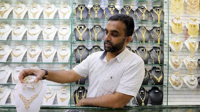 Mohammed Iqbal, a jewellery trader in Deira Gold Souq, says the price of gold has consistently gone up since December 2019. Pawan Singh / The National
