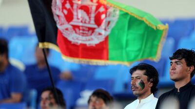 Afghanistan fans watch the game.