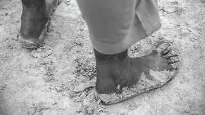 The men play barefoot