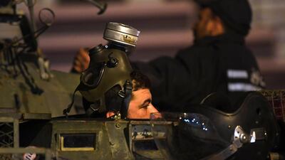 More than 200 people have been arrested and dozens of police hurt during clashes in Tunisia. Fethi Belaid / AFP Photo
