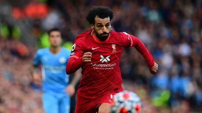Liverpool's Mohamed Salah runs for the ball. AFP