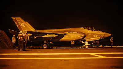 US Sailors conduct night flight operations aboard USS George Washington (CVN 73) as the ship sails in regional waters supporting operations in the Middle East. Photo: Centcom