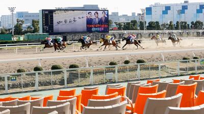 A horse race is held without spectators amid growing concern about the spread of a new coronavirus, in Tokyo on Thursday, February 27. AP