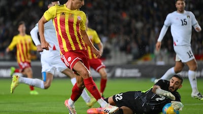 Ramon Terrats of Catalonia is challenged by Rami Hamada of Palestine. Getty Images