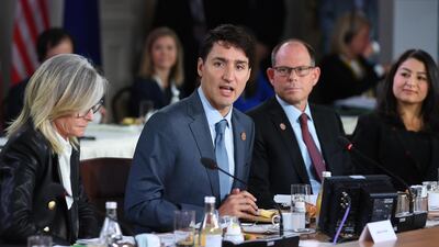 Canadian Prime Minster Justin Trudeau speaks at the G7 Gender Equality Advisory Council Breakfast. Neil Hall / EPA