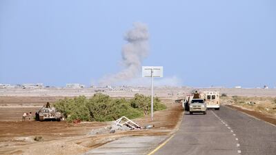Yemeni pro-government forces patrol during clashes with Houthi rebels in western Dhubab district, about 30km north of the strategic Bab Al Mandeb Strait, on January 11, 2017, during the early stages of a major offensive to push the rebels from coastal areas. Saleh Al Obeidi / AFP