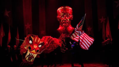 The Morning of the Dragon scene is performed during a photocall for the musical Miss Saigon at the Prince Edward Theatre in London, Monday, May 19, 2014. Producer Cameron Mackintosh’s new production of Alain Boublil and Claude-Michel Schonberg’s musical will open at the theatre in May, 25 years after the original production. Matt Dunham / AP photo