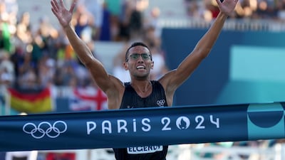 Ahmed Elgendy of Egypt reacts after he crosses the finish line during the men's modern pentathlon laser run at the Paris Olympics in Versailles on Saturday, August 10, 2024. Getty Images