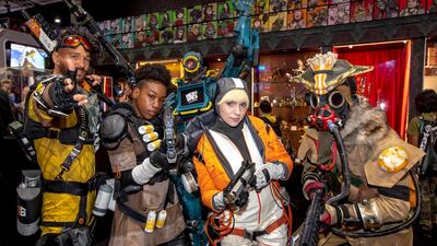 From left: Kevin Morra "Mirage," Louisette St. Fort "Bangalore", Gabrielle Zverina "Watson" and Chris Guidotti "Bloodhound" from Toronto pose as characters from Apex Legends. AP Photo