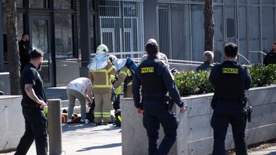 Police officers and firefighters at the scene outside the US embassy in Copenhagen on Friday. Reuters