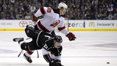 Jaromir Jagr, rear, has continued his goal-scoring exploits with New Jersey Devils despite his professional hockey career entering its third decade. Mark J. Terrill / AP Photo