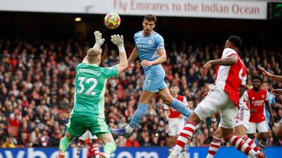 Ruben Dias - 7: Should have opened scoring but headed glorious chance wide after 15 minutes. Acrobatic clearance to deny Lacazette a first-half chance. Reuters