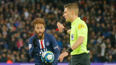 PSG's Neymar gestures to referee Willy Delajod. AP