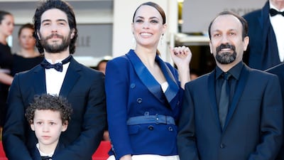 epa03705149 (L-R) French actor Tahar Rahim, actor Elyes Aguis, French actress Berenice Bejo and Iranian director Asghar Farhadi arrive for the screening of 'Le Passe' (The Past) during the 66th annual Cannes Film Festival in Cannes, France, 17 May 2013. The movie is presented in the Official Competition of the festival which runs from 15 to 26 May. EPA/GUILLAUME HORCAJUELO *** Local Caption *** 03705149.jpg