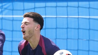 England's Declan Rice takes a painful blow during training. Getty Images