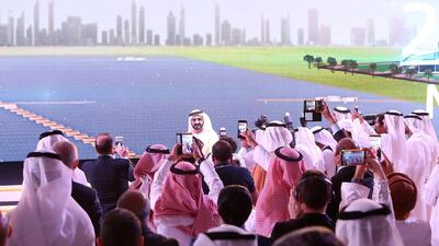Sheikh Mohammed bin Rashid, Vice President and Ruler of Dubai, inaugurates the second phase of the Mohammed bin Rashid Al Maktoum solar park in Dubai. Pawan Singh / The National