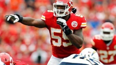 FILE - In this Sept. 30, 2012 file photo, Kansas City Chiefs inside linebacker Jovan Belcher (59) gestures at the line of scrimmage during an NFL football game against the San Diego Chargers in Kansas City, Mo. Police say Belcher fatally shot his girlfriend early Saturday, Dec. 1, 2012, in Kansas City, Mo., then drove to Arrowhead Stadium and committed suicide in front of his coach and general manager. (AP Photo/Ed Zurga, File) *** Local Caption *** Chiefs Player Shooting Football.JPEG-01cfe.jpg