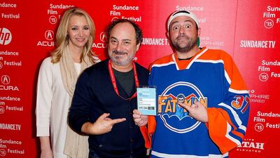 From left, Lisa Kudrow, Kevin Pollak and Kevin Smith at the premiere of Misery Loves Comedy at the Sundance Film Festival. Joe Scarnici / Getty Images for Sundance / AFP