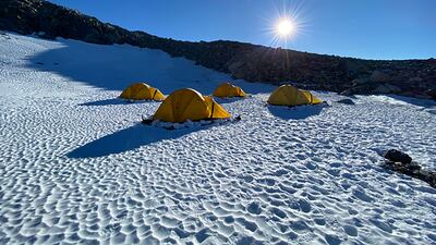 The team endured freezing temperatures of -10°C and spent days riding snowmobiles, trekking through ice fields and sleeping in tents.