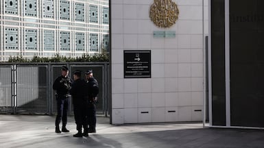 Police outside the Arab World Institute in Paris as officers search the building in connection with an investigation into its former chief, Jack Lang, and his ties to Jeffery Epstein. Reuters