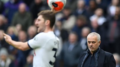 Jose Mourinho looks on as Tottenham defender Ben Davies takes a throw-in. AFP